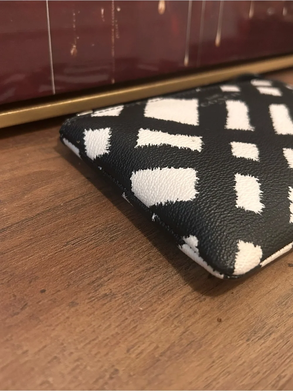 Coach Black and White Geometric Leather Wristlet